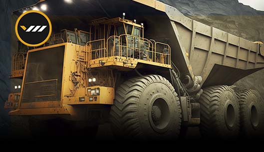 Veículo de grande porte transportando grande volume, operação que exige habilitação por meio do curso de transporte de carga indivisível.